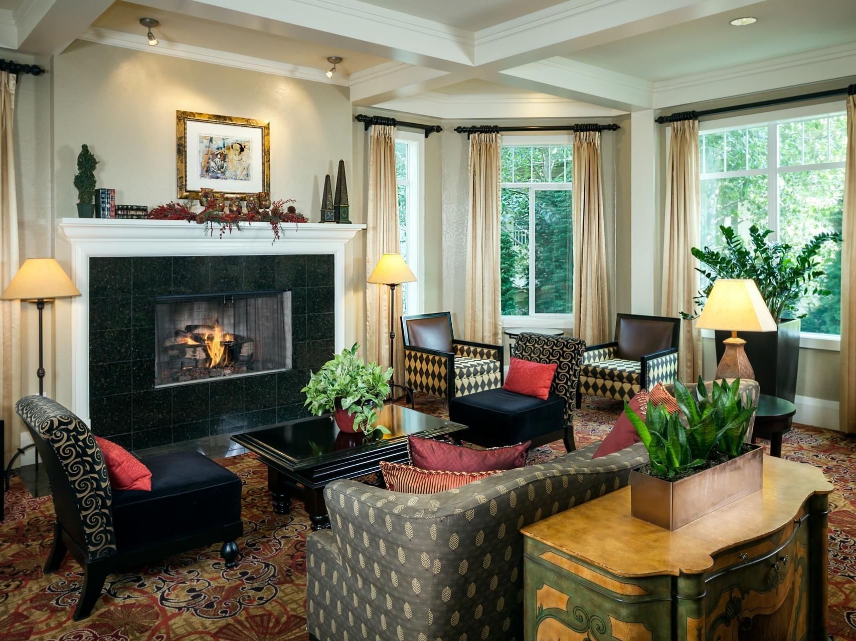 Interior of the lobby area by Plaza Inn & Suites at Ashland Creek​