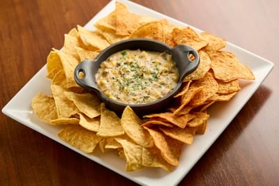 Close-up of chips with corn dip at The IowaStater Restaurant