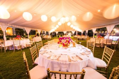 Table setup for a outdoor celebration at Somerset On Grace Bay