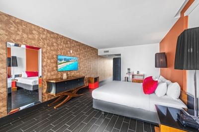 Queen beds, TV and work space in Premium 2 Bedroom 2 Bath with Balcony at Fairwind Hotel Miami