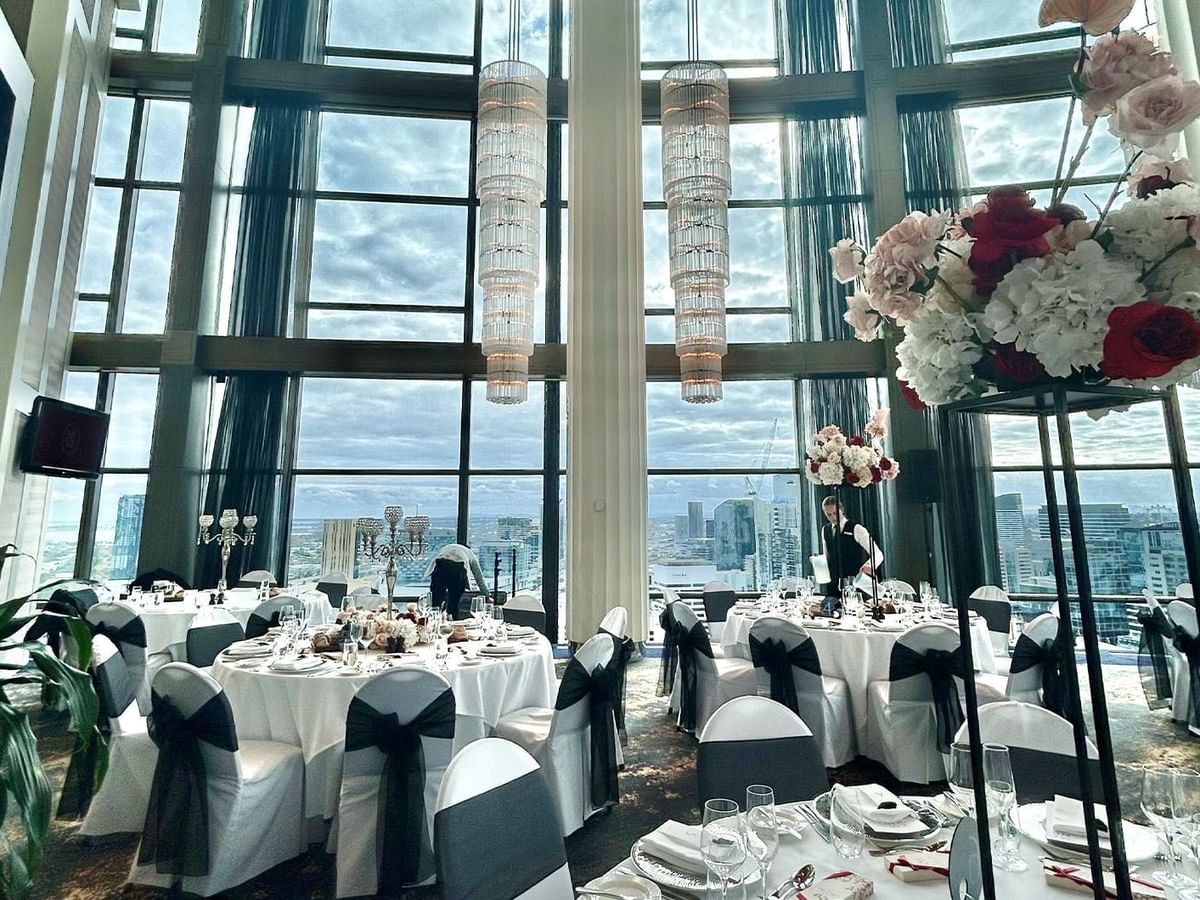 Table arrangement with floral decor for Felicia and Jonathan's wedding at Crown Towers Perth