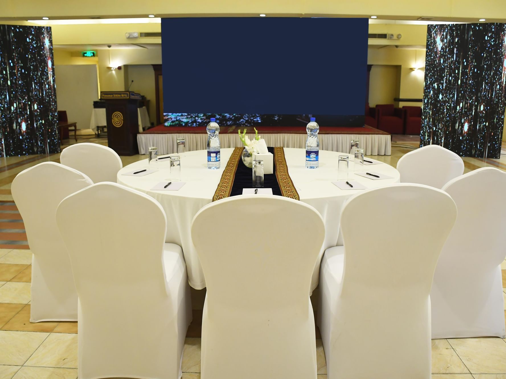 Round table set up in Zamrud Hall, Peshawar Serena Hotel