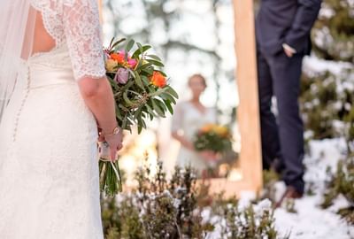 Bride with a bouquet at the Cradle Mountain Hotel