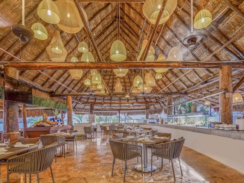 Tables, chairs & lights in Restaurante La Palapa at FA Hotels