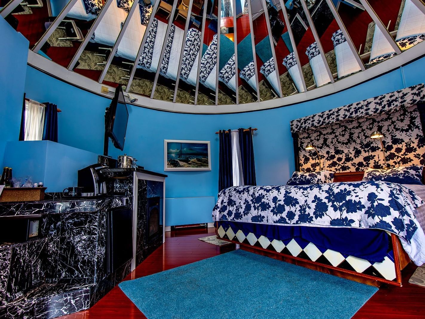 Comfy bed in King Upper Tower Room at La Tourelle Hotel & Spa