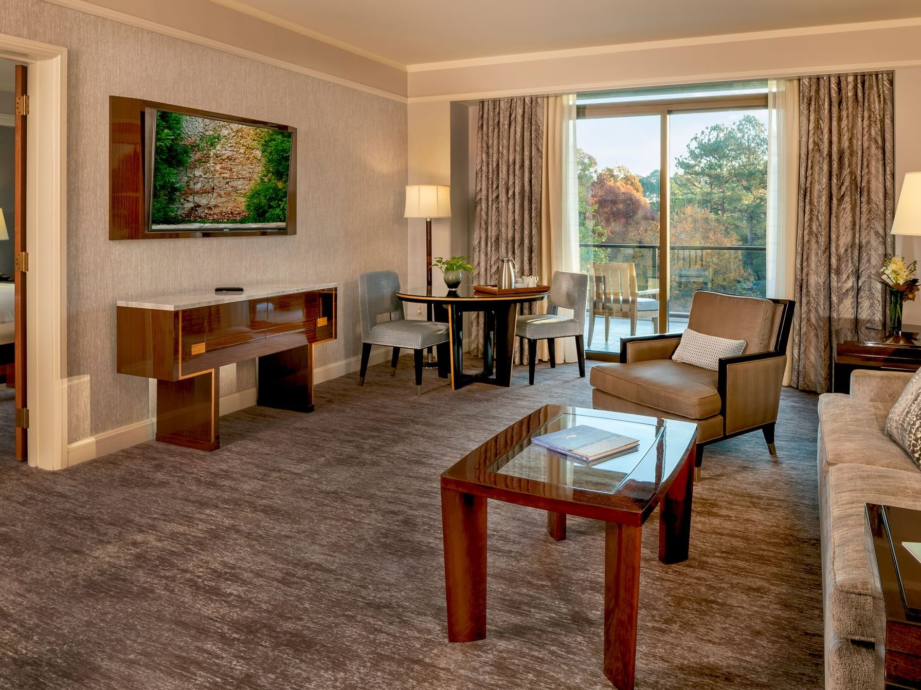 Spacious Livingroom area with original artwork in Governor's Suite at The Umstead Hotel and Spa