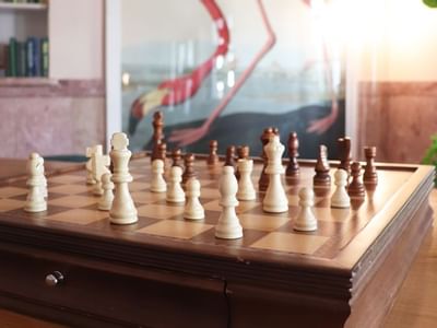 Close-up of a chessboard on a table at South Beach Hotel