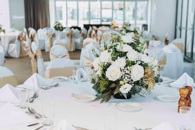 Floral banquet tables arranged at Amora Hotel Melbourne