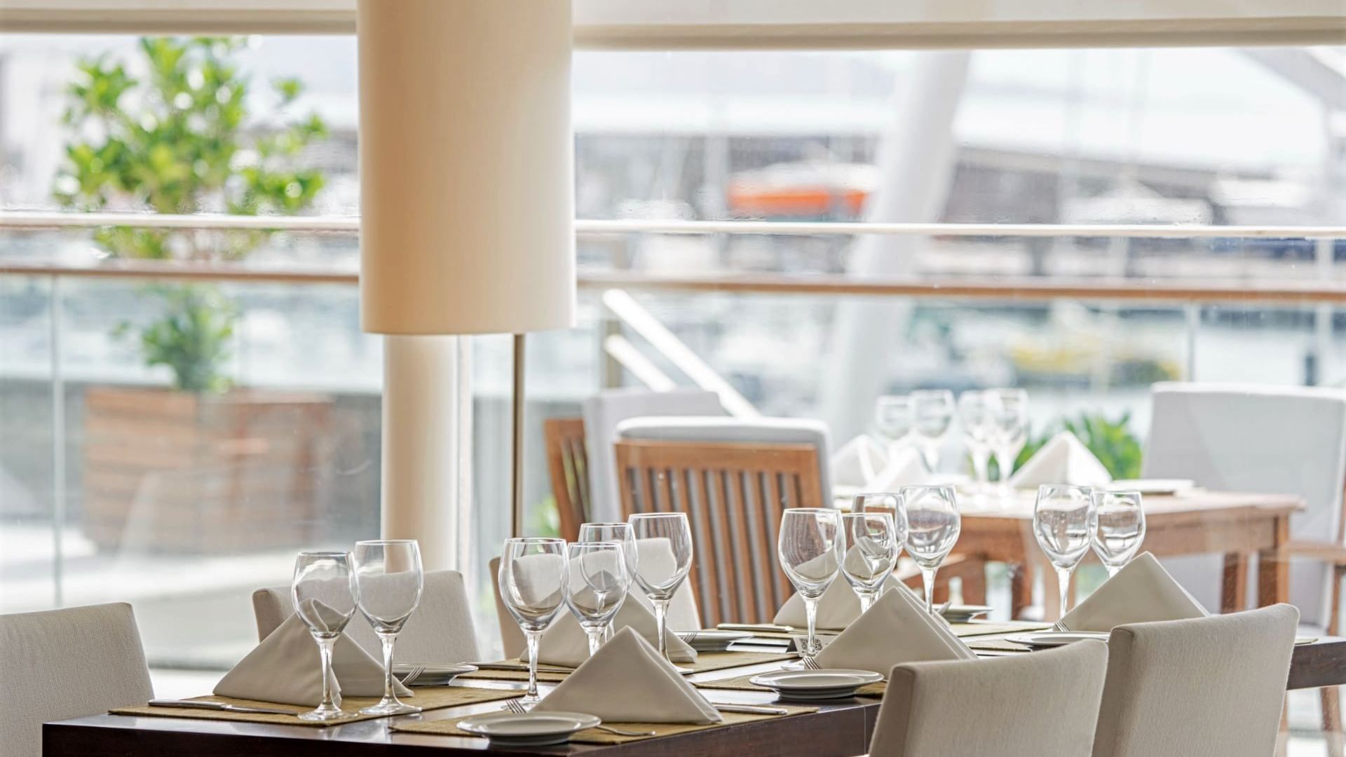 Glasses set-up on a dining table in Escuna Restaurant at Hotel Marina Atlântico