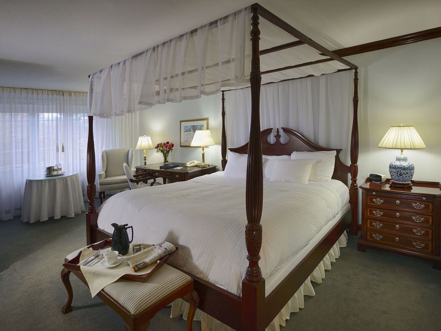 View of Traditional King with king bed at Avon Old Farms Hotel