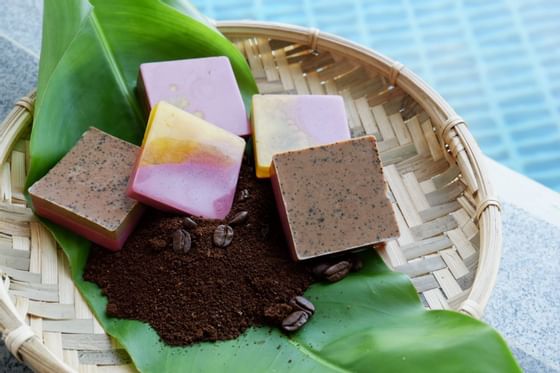 closeup of soap cubes on a Reed pate at Amatara Wellness Resort