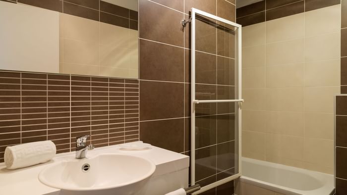 Bathroom vanity in bedrooms at Hotel Dau Ly