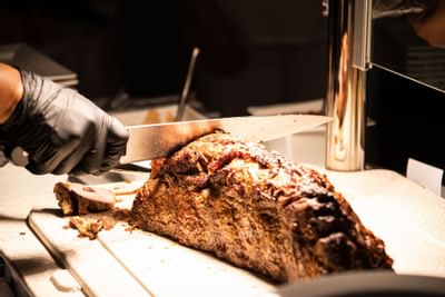 Chef slicing roast beef at The Morgan Resort Spa Village