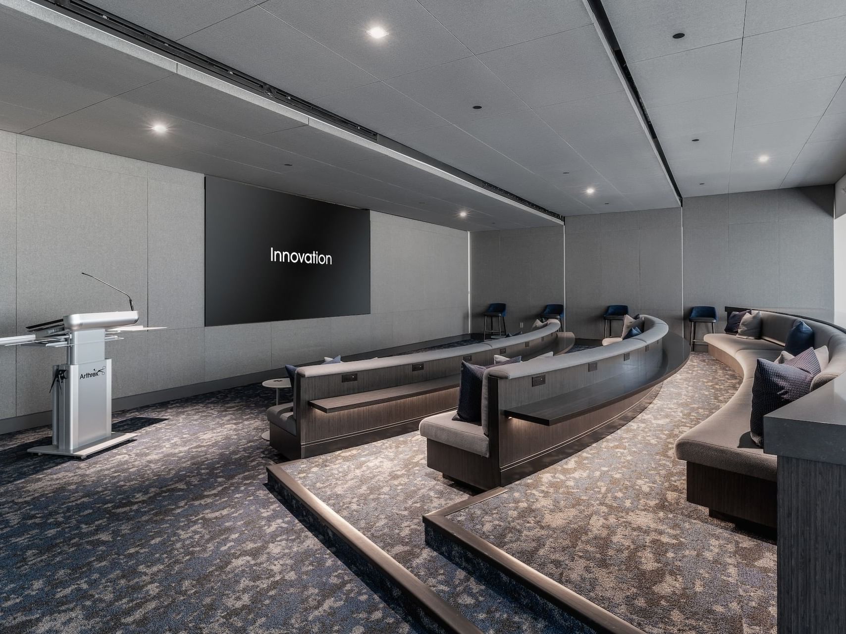 Cinema with large screen & comfy seating at Innovation Hotel