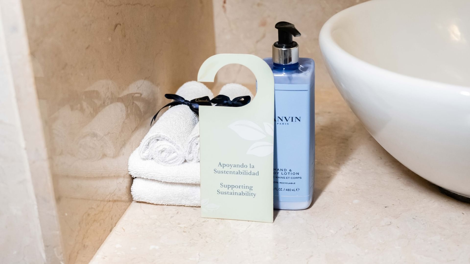 Toiletries and a sign supporting sustainability in a King Superior room at Quinta Real Puebla, Heroica Puebla de Zaragoza.