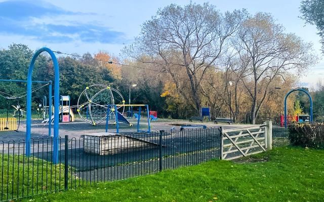 park at goldsworth park lake in woking