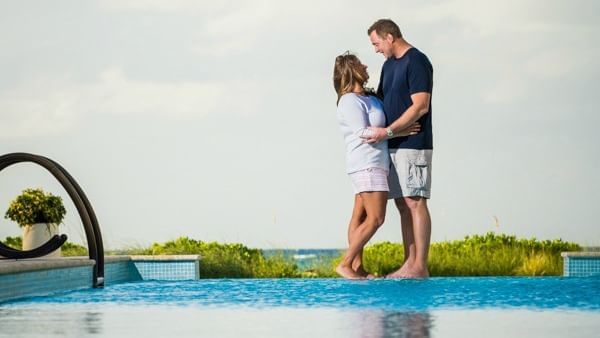 Couple posing for a picture at The Somerset On Grace Bay