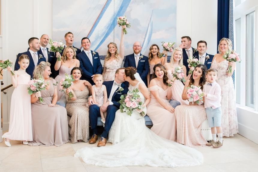 Large family poses for a photo during a wedding at our South Jersey wedding venue