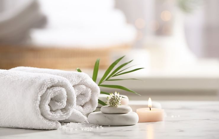 Close-up of towels & candles in Verde Day Spa at Blackstone Mountain Lodge