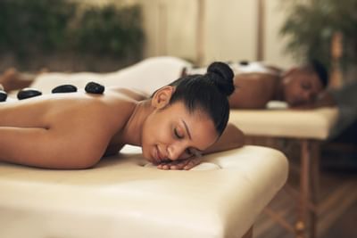 A couple receiving treatments in the spa at Sunseeker Resort