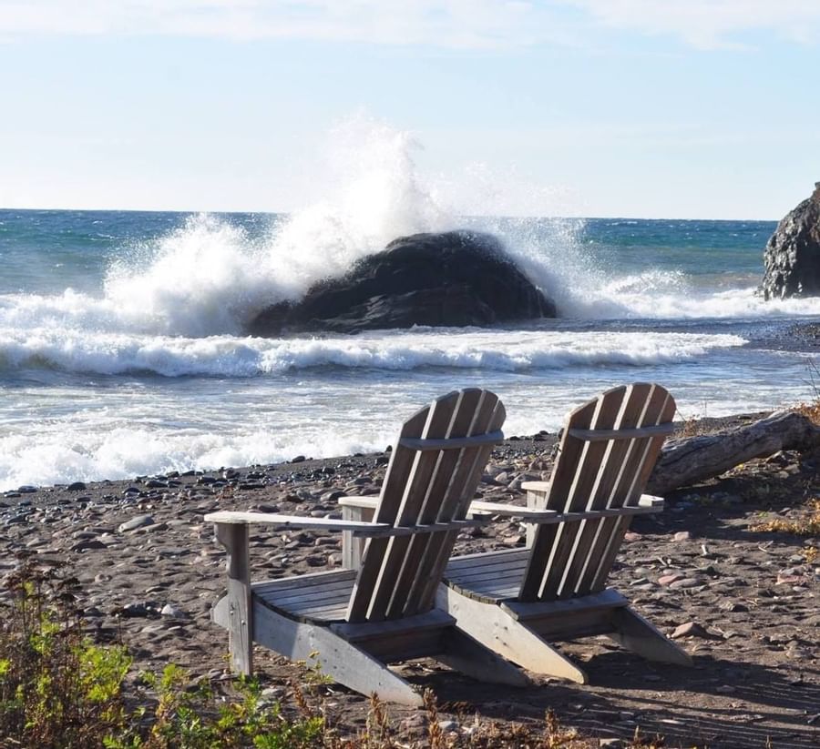 Two chairs by the beach near Lutsen Resort