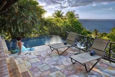 Photo of the lush poolside deck
