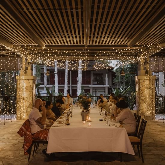 People in dining area at Pullman Palm Cove Sea Temple Resort