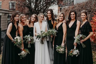 Bride and maids posing the photograph at the Venue at Portwalk