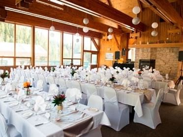 Dining tables arranged in Mountain Chalet at Fairmont Hot Springs Resort