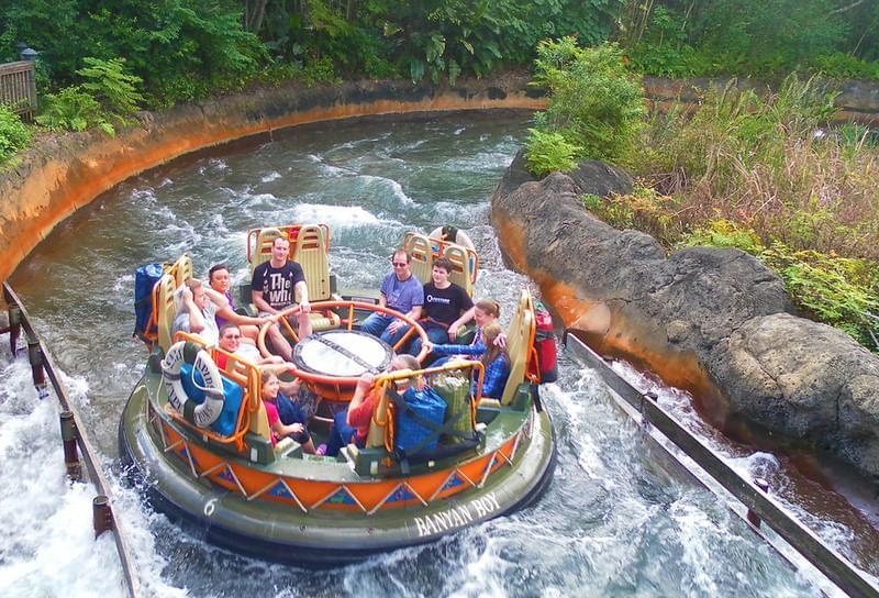 A raft floats through the Kali River Rapids, an Orlando water ride in Walt Disney World Resort.