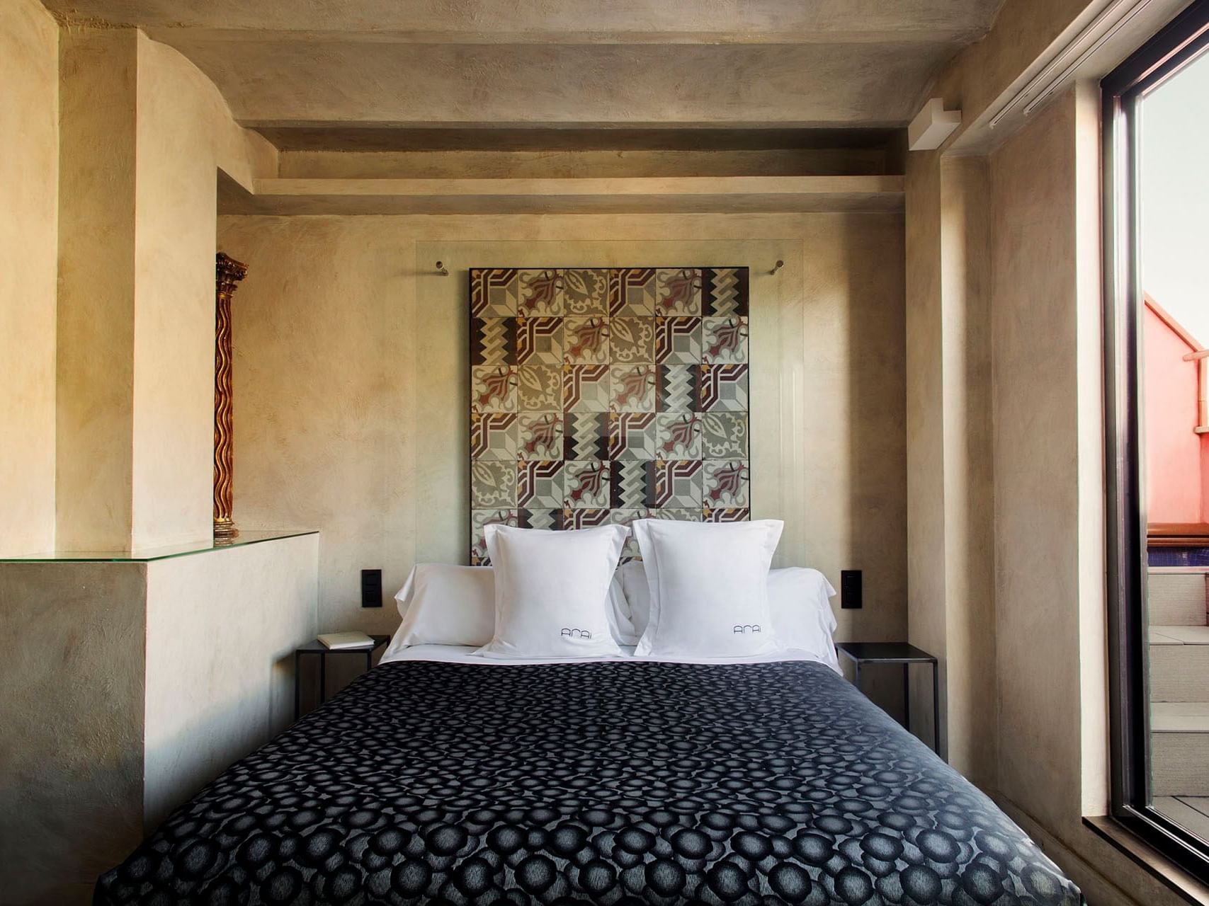 Bedroom arrangement in Jewel Suite at Barcelona Apartment