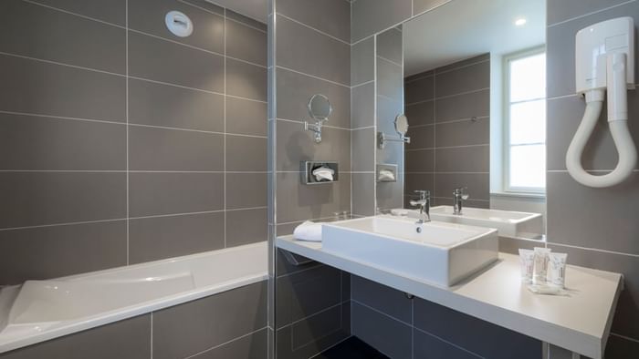 Bathroom vanity of Junior suites rooms at Demeure des Remparts