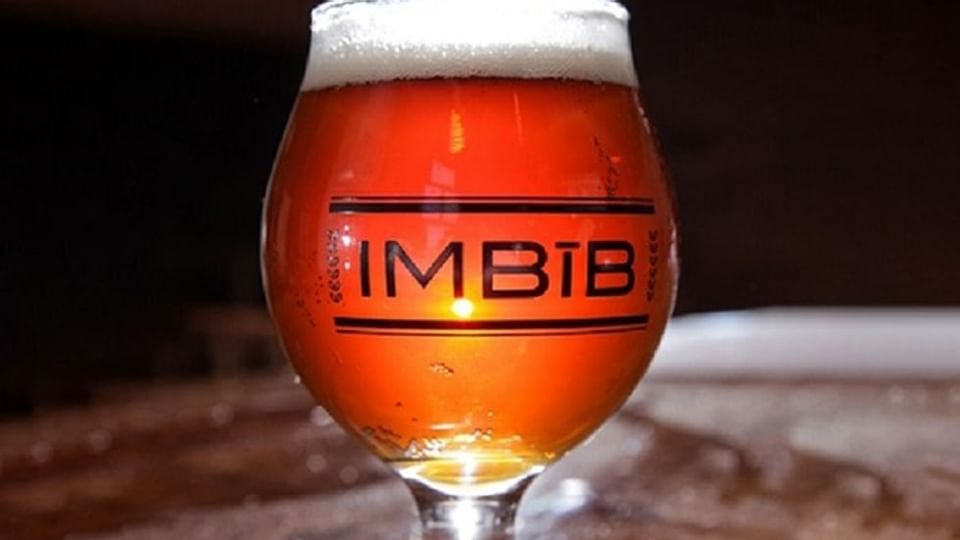 Beer glass of IMBIB custom brews near Legacy Vacation Resorts