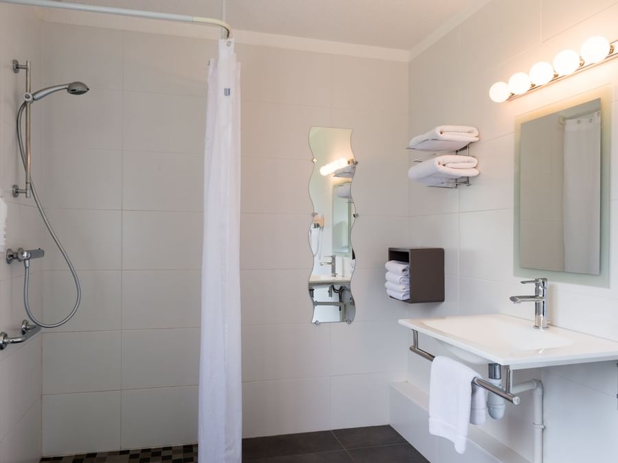 Bathroom vanity in bedrooms at Hotel La Terrasse