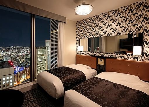 APA Resorts guest room with two beds