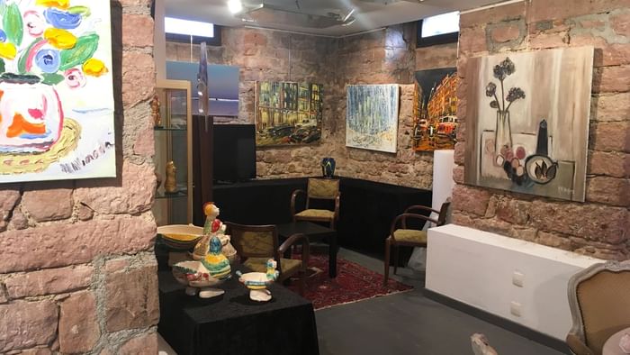 Interior of an art gallery with brick walls at Originals Hotels