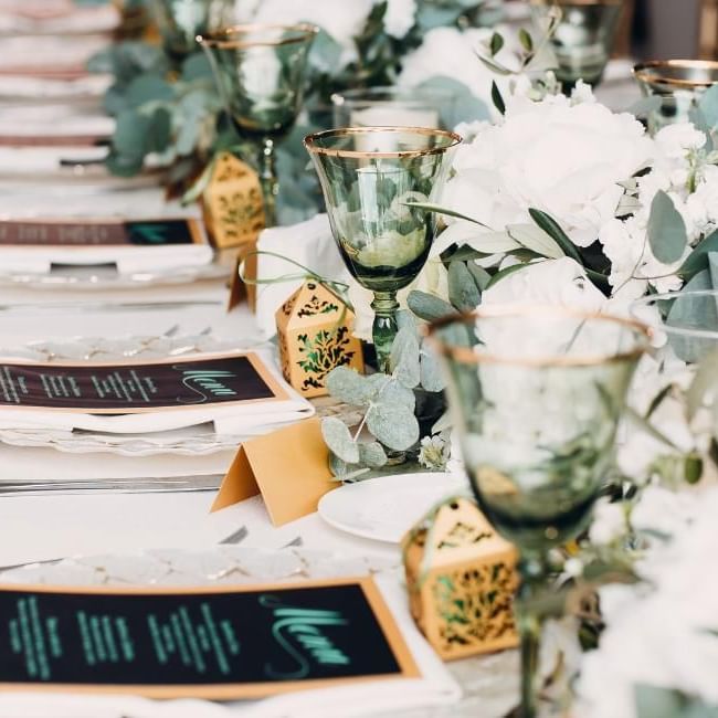 Close up of nature inspired table decor, featuring our article on 