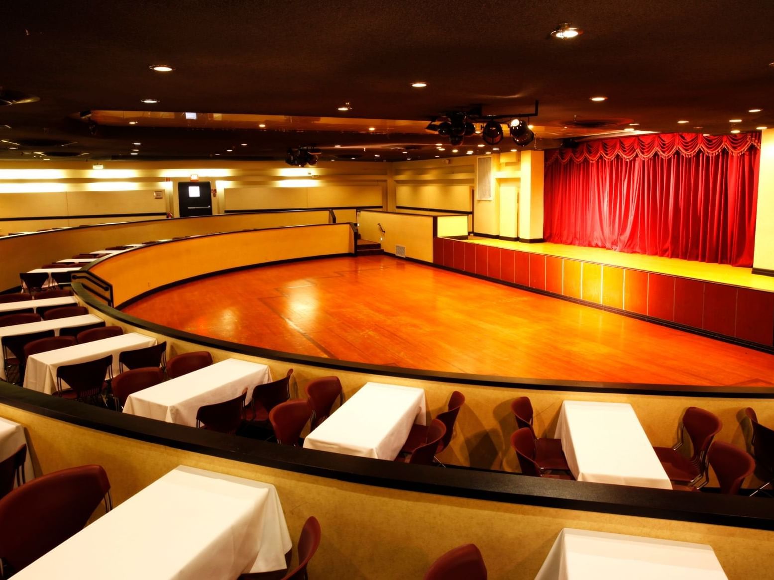 Theatre seats with stage in Atlantic Hall at Honor’s Haven