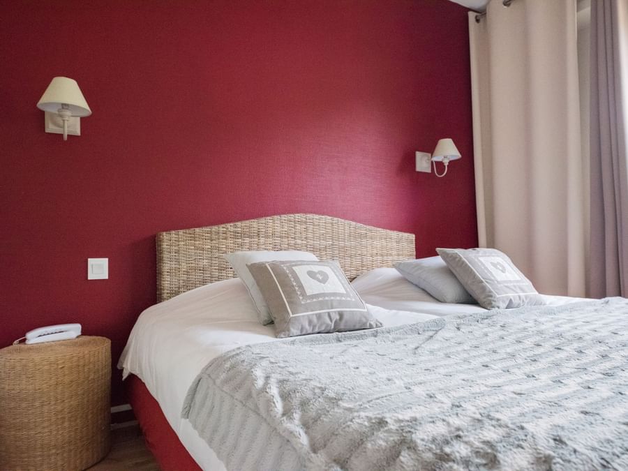 Double bed in Chambre Confort at Originals Le Kastelberg