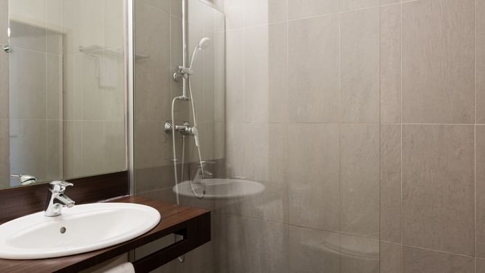 Bathroom vanity in bedrooms at Hotel Otelinn
