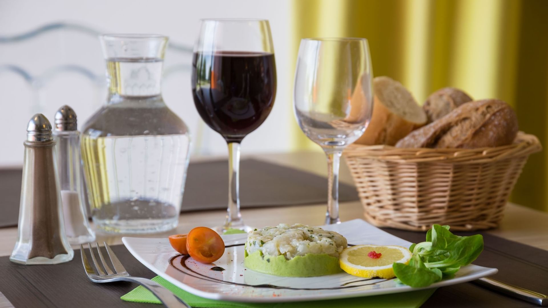 Closeup of tapas and wine served at Originals Hotels
