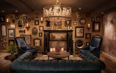 antique lounge area with sofa and wall art