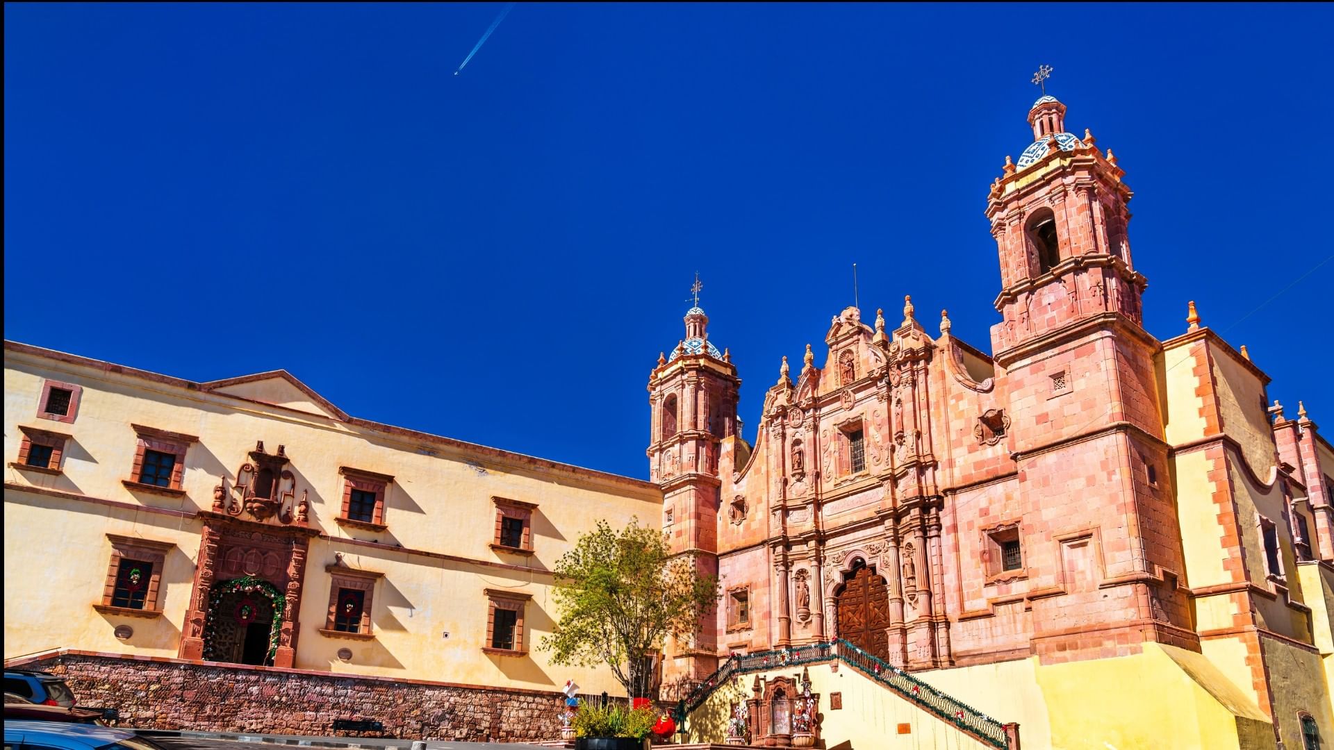 Centro histarico de Zacatecas with ornate stone carvings under a clear blue sky near Quinta Real Zacatecas