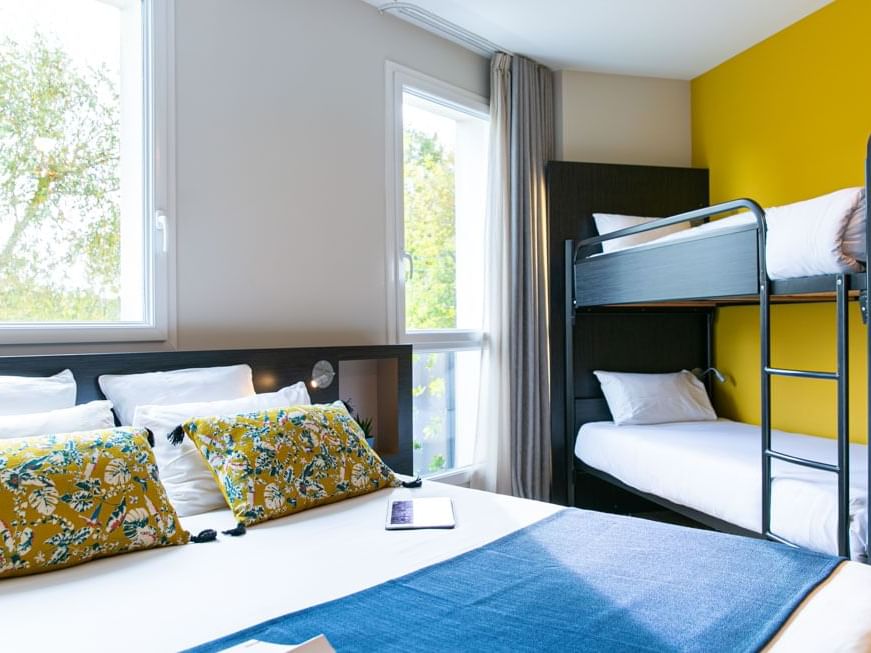 Bunk beds by the king bed in Superior Room at Hotel Saint James