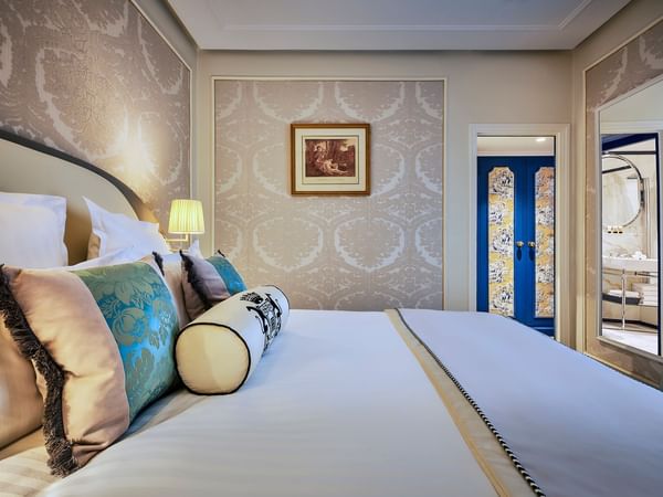 Interior of Superior Room with luxury patterned wallpapers at Hôtel Westminster - Paris