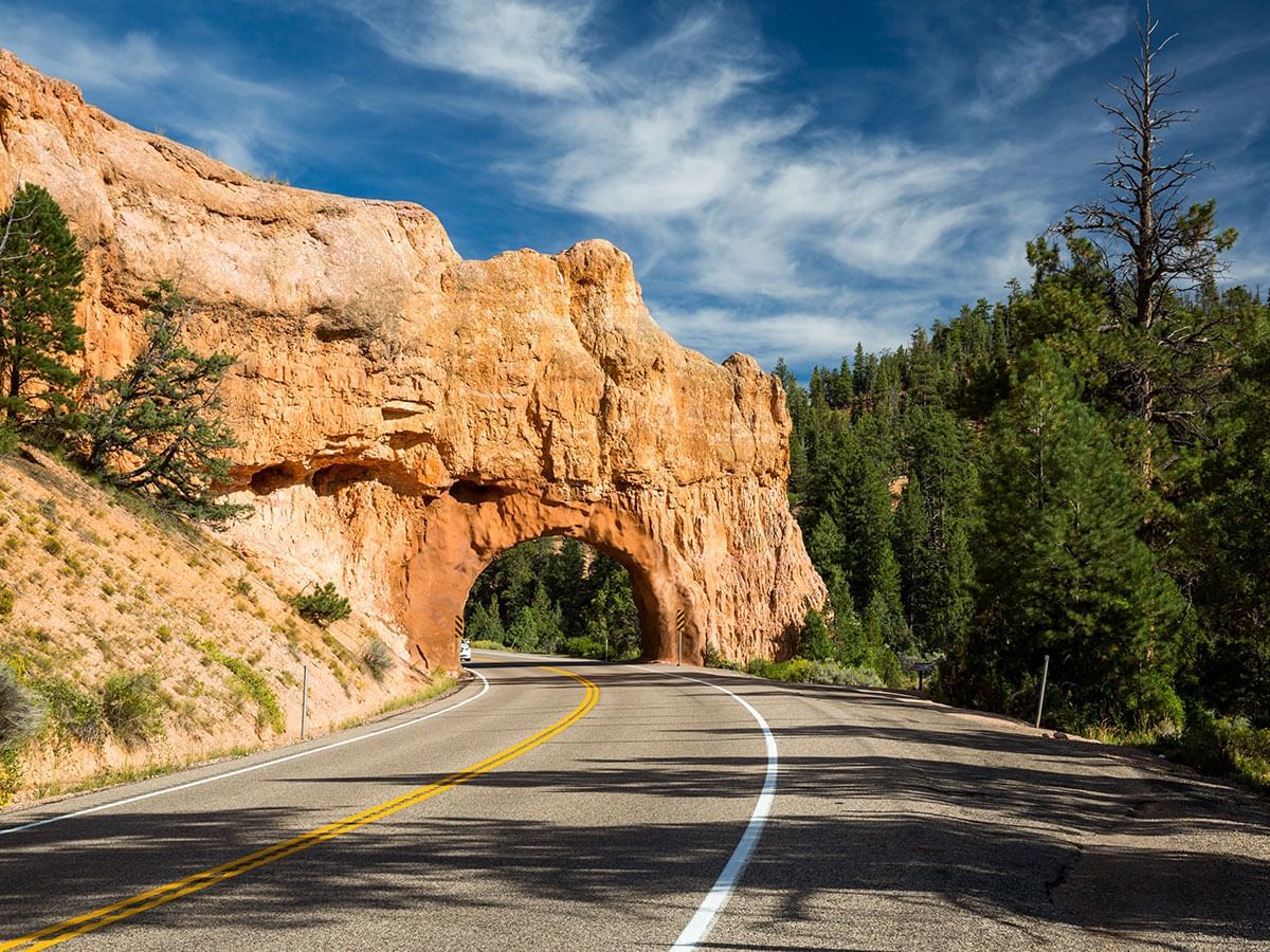 mountains with hole for cars