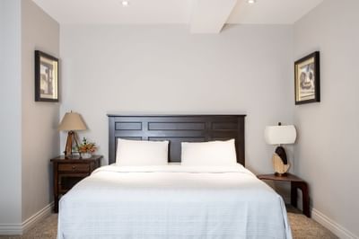 King bed, nightstands & wall arts in Executive Residences 201 at Retro Suites Hotel