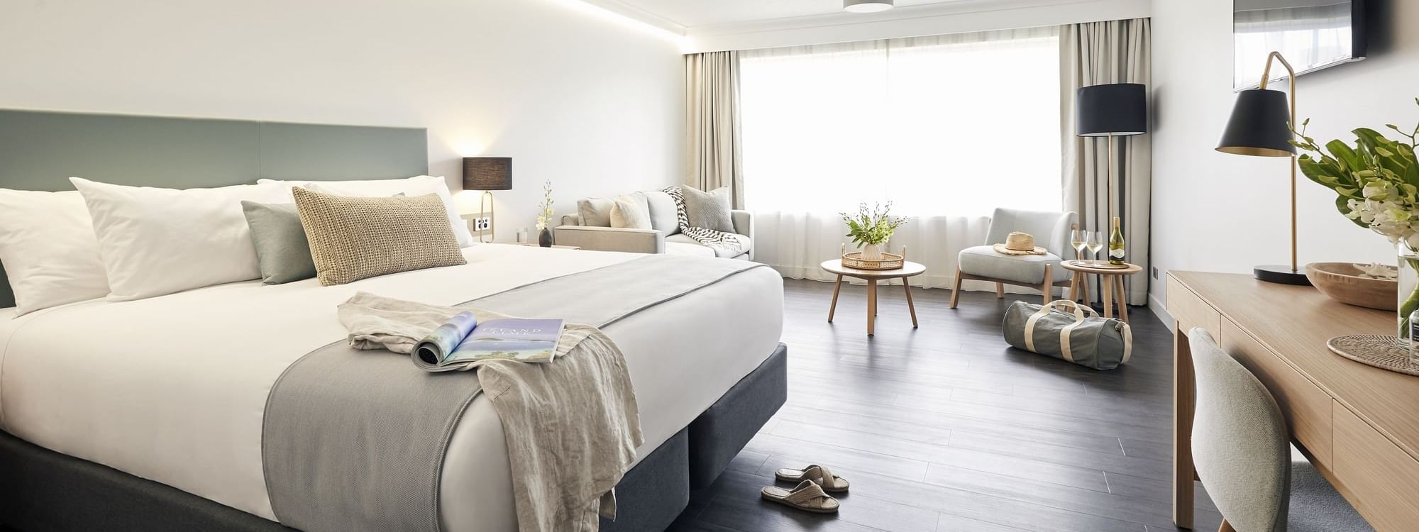 Modern king bed in Resort Room at Daydream Island Resort