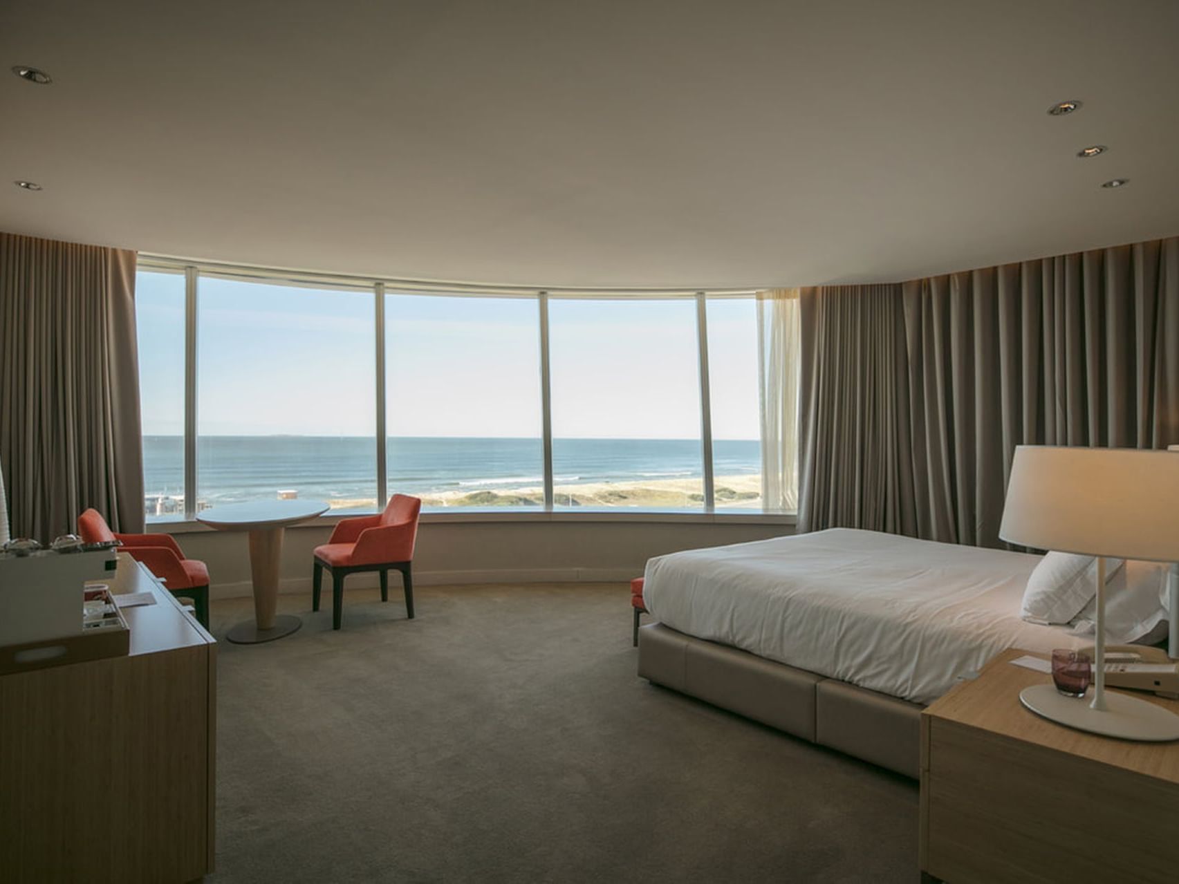 King bed & lounge with a view in Ocean Front, Grand Hotels Lux