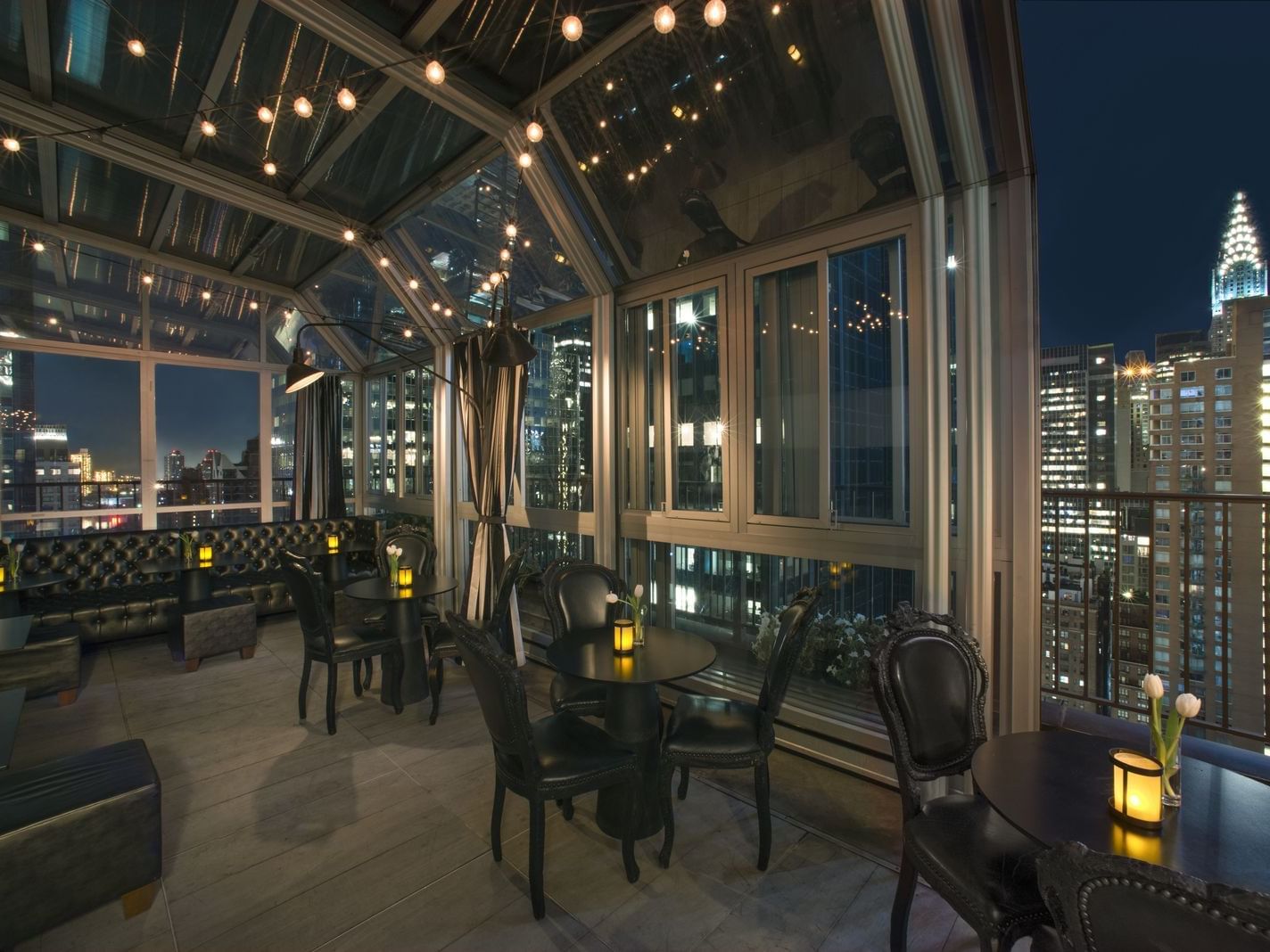 Dining area at the Upstairs in Kimberly Hotel at night